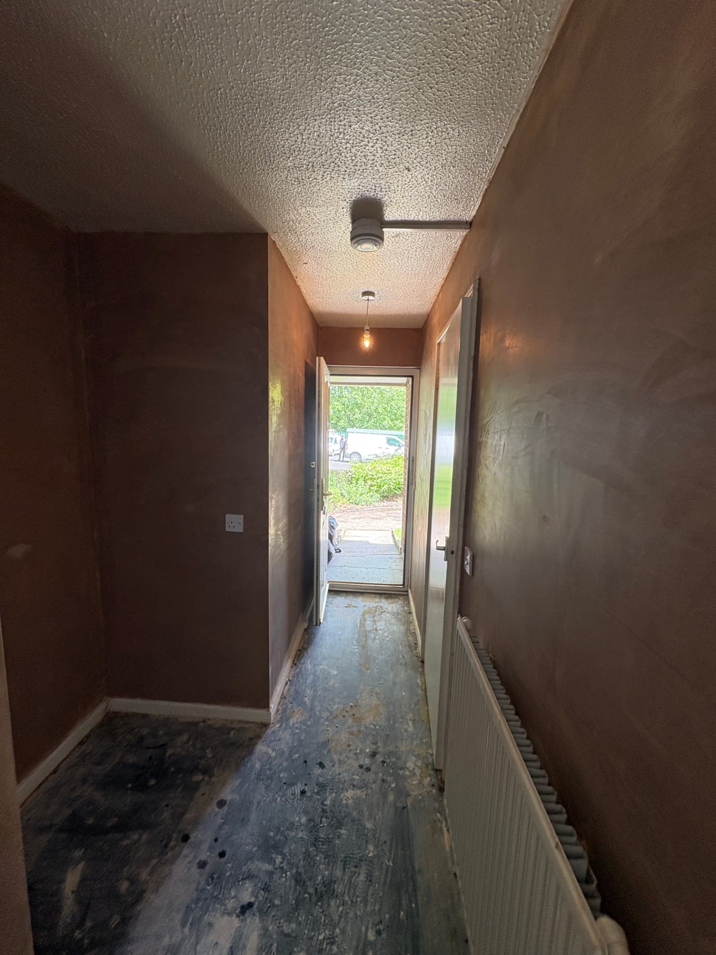 Hallway walls freshly skimmed, Manchester