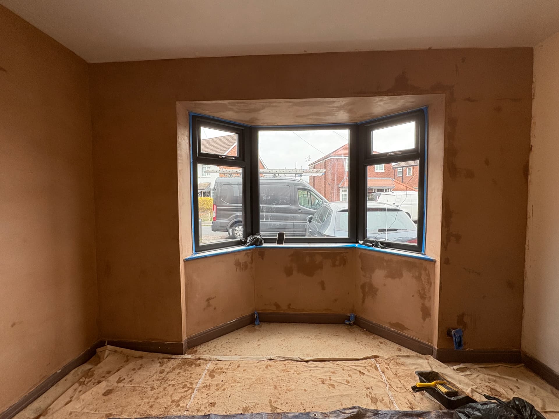 Bay window bedroom fully replastered, Manchester