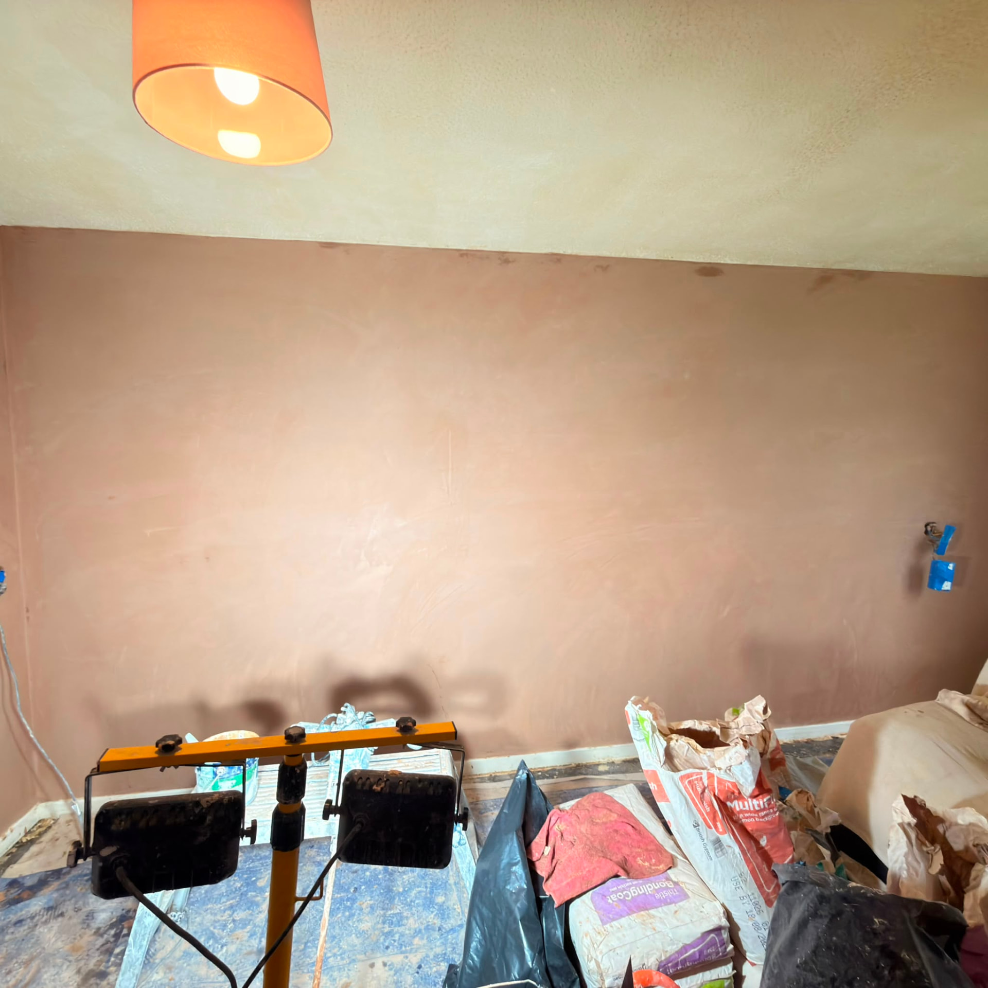 Wall skimmed to a flat, paint-ready finish
